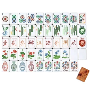 Flat lay of complete Auspicious Koi Mahjong Tiles, including dots, bamboo, wan, flower, wind, koi joker tiles, lion dragon tiles and spare blank tiles.