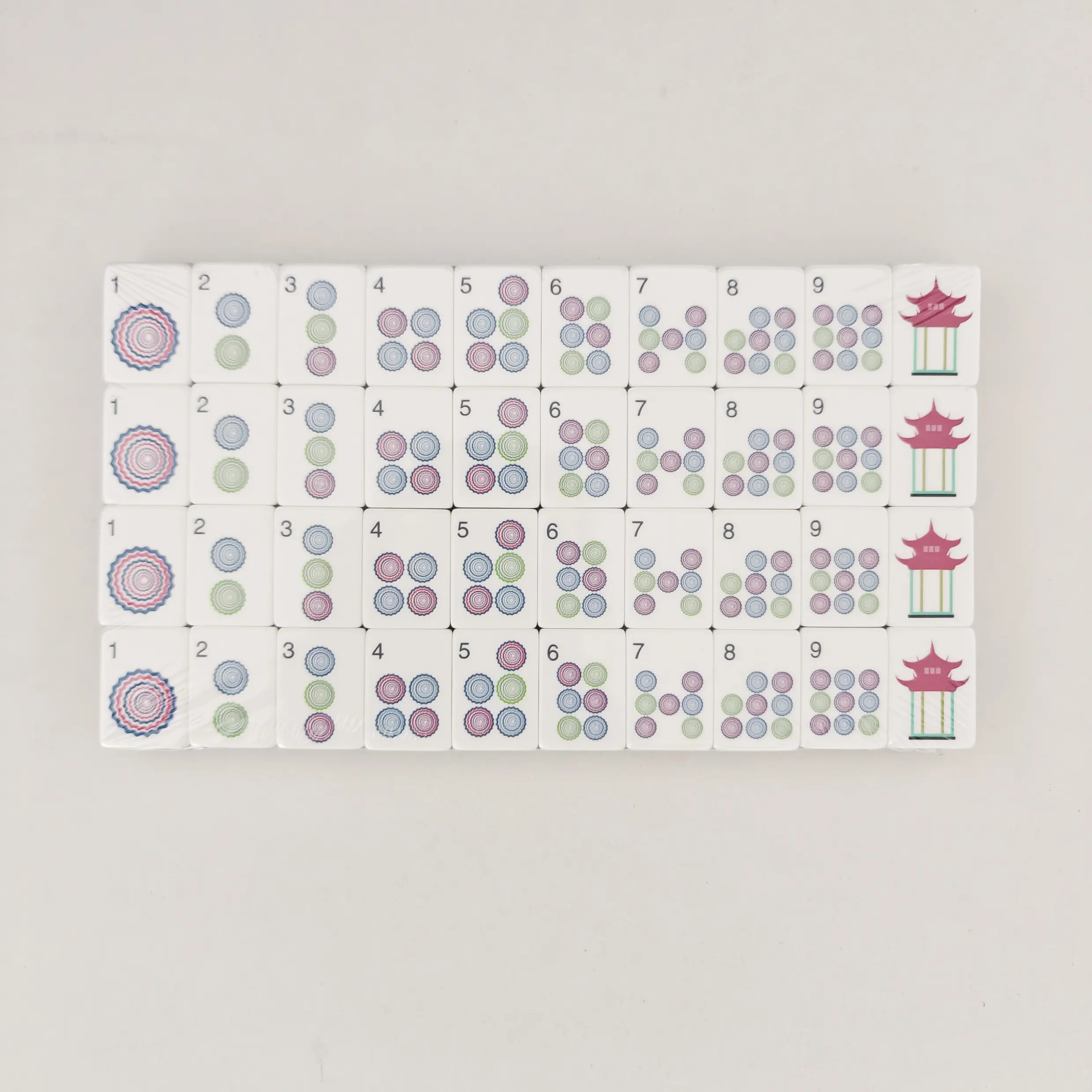 Complete 4-row grid display of OMHJGO Pagoda Breeze Mahjong Dot tiles showing concentric circle patterns and pagoda towers.