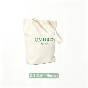Beige Canvas Tote Bag printed with green OMHJGO MAHJONG branding marked with product dimension specs